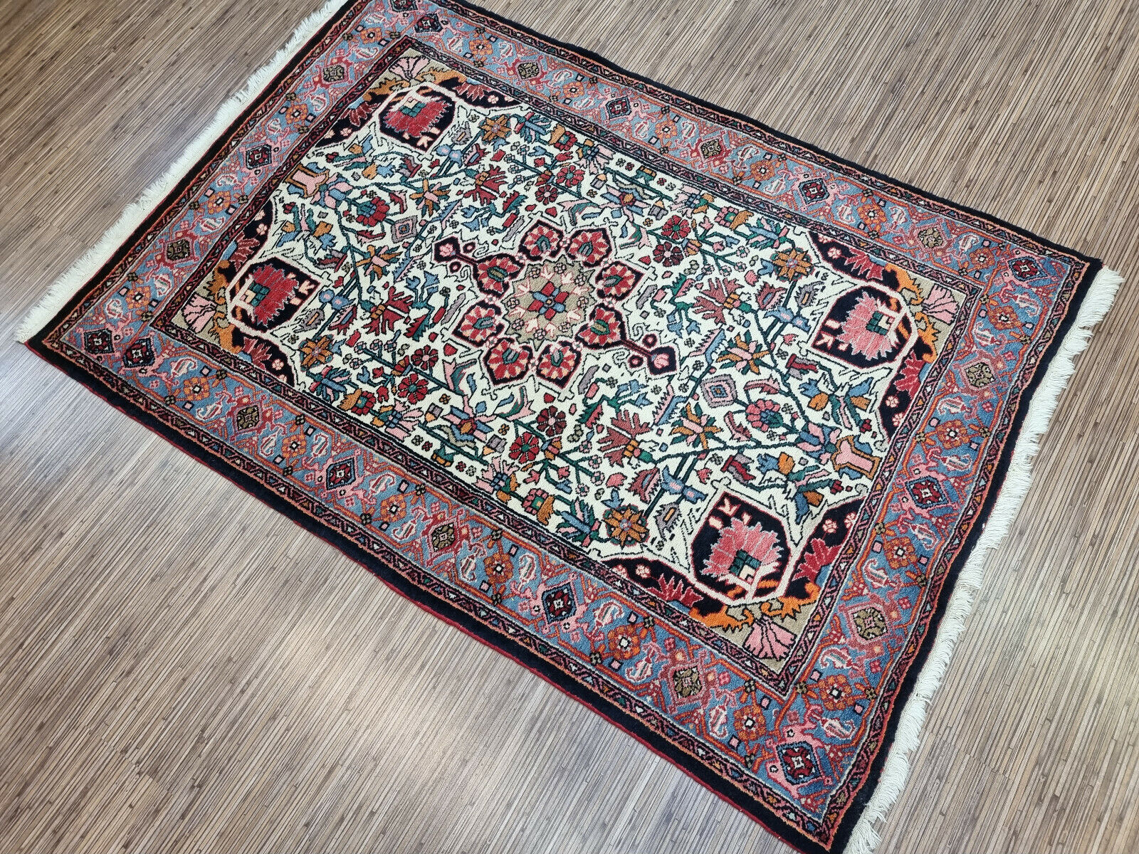 A Touch of Luxury: Enhance your space with this Handmade Vintage Persian Style Bidjar Rug (3.4' x 5').