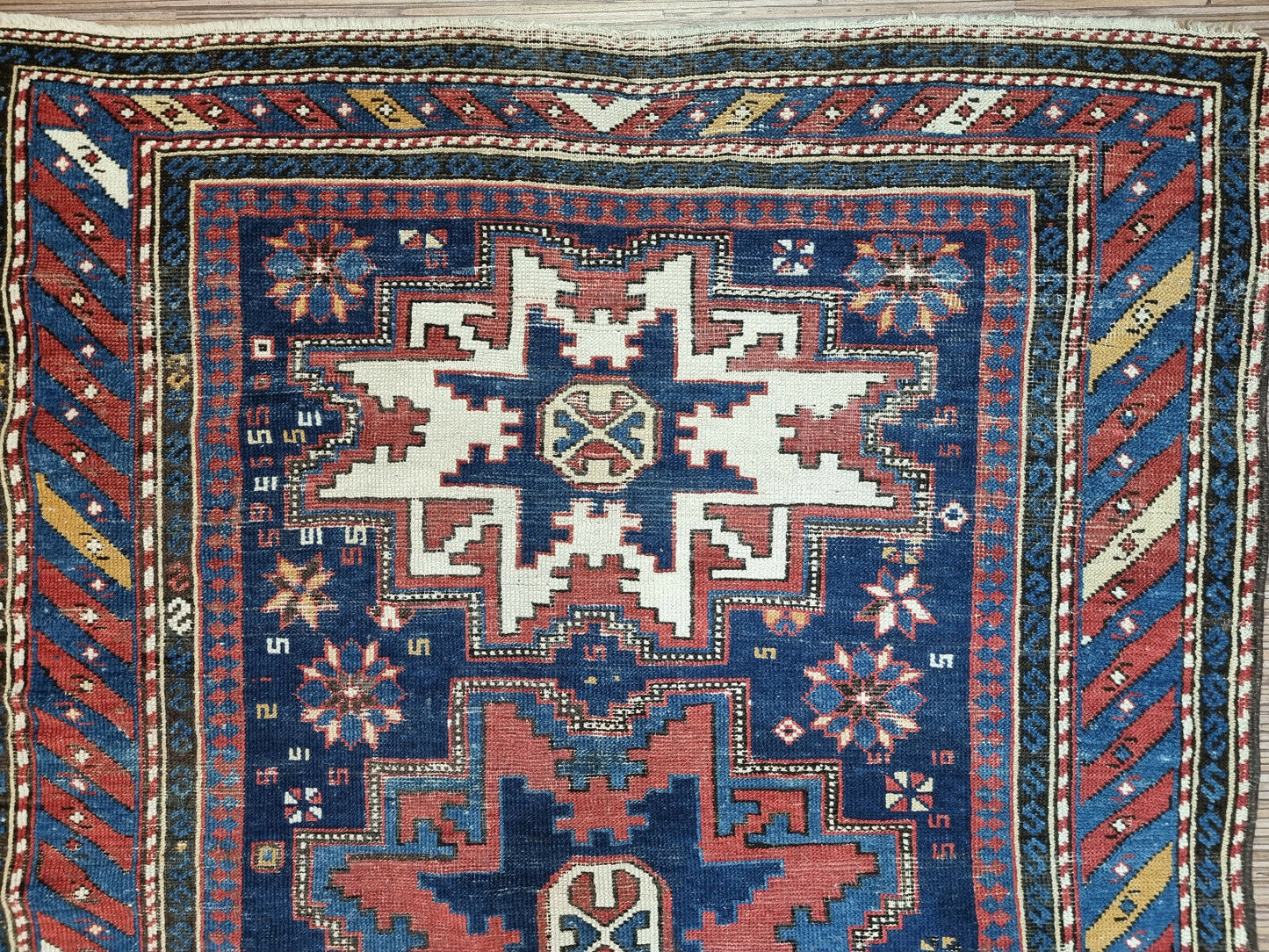 Statement Rug for Your Space: Elevate your home décor with this Antique Shirvan Rug, a conversation starter and a unique piece of art.