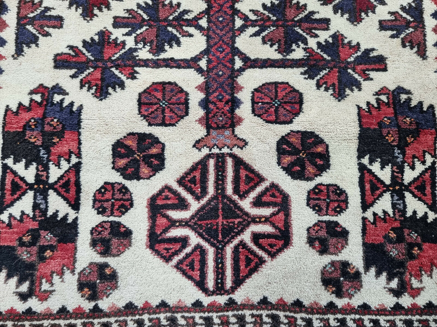 Handwoven Afghan Artwork: Invest in a piece of history: Vintage Baluch Prayer Rug (1950s) with intricate design.