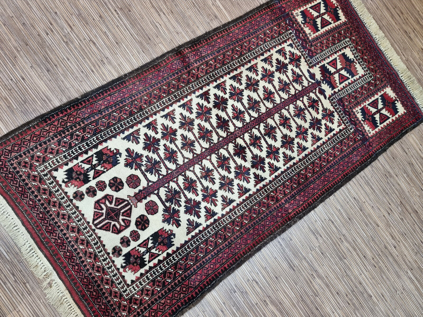 Cultural Tapestry: Immerse yourself in Afghan heritage with this Vintage Baluch Prayer Rug (2.7' x 5.5').