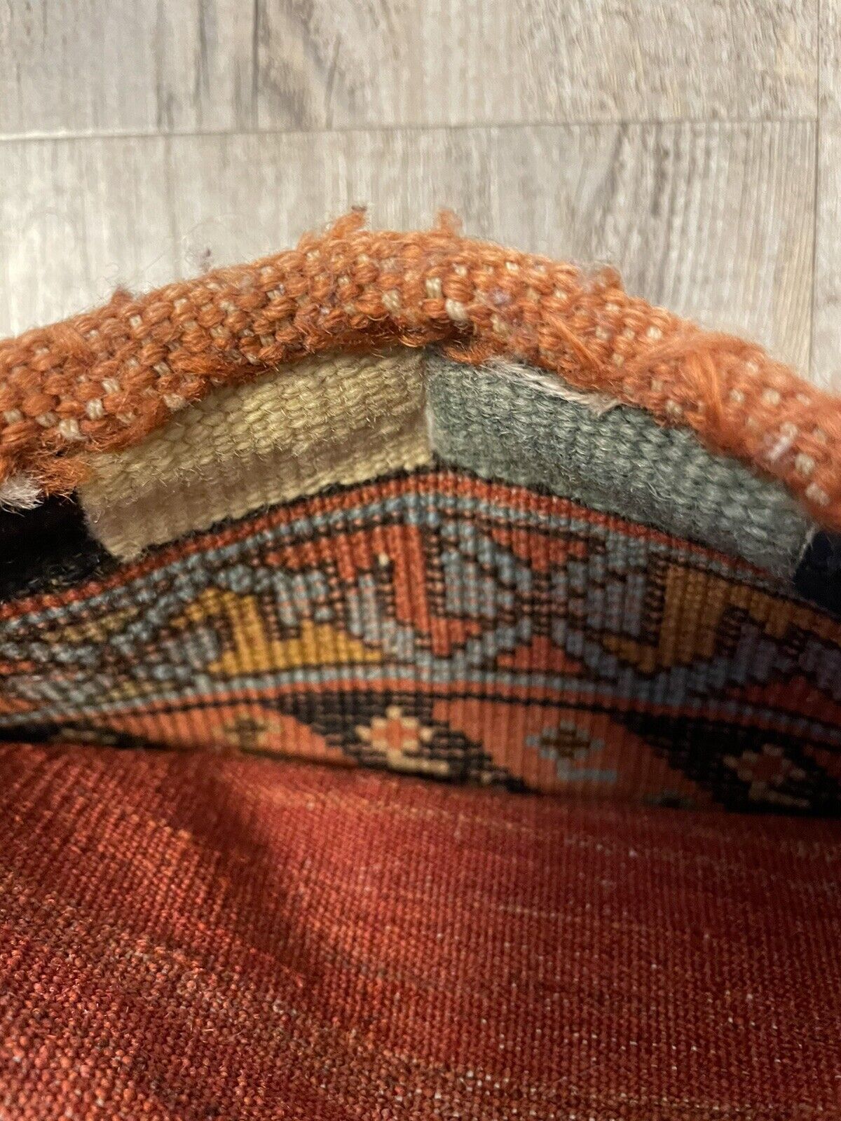 A close-up of the intricate weaving technique used in the Gashgai bag, showcasing the craftsmanship of generations past.