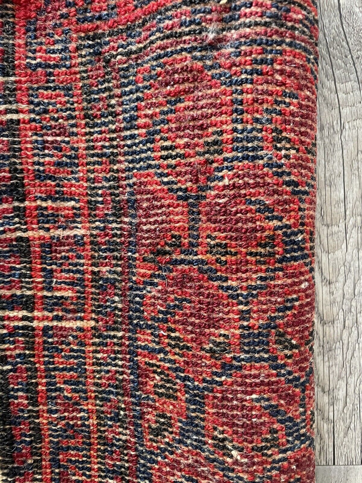 Versatility as a Rug: The Shiraz bagface (1900s) laid flat, showcasing its versatility as a decorative rug or wall hanging.