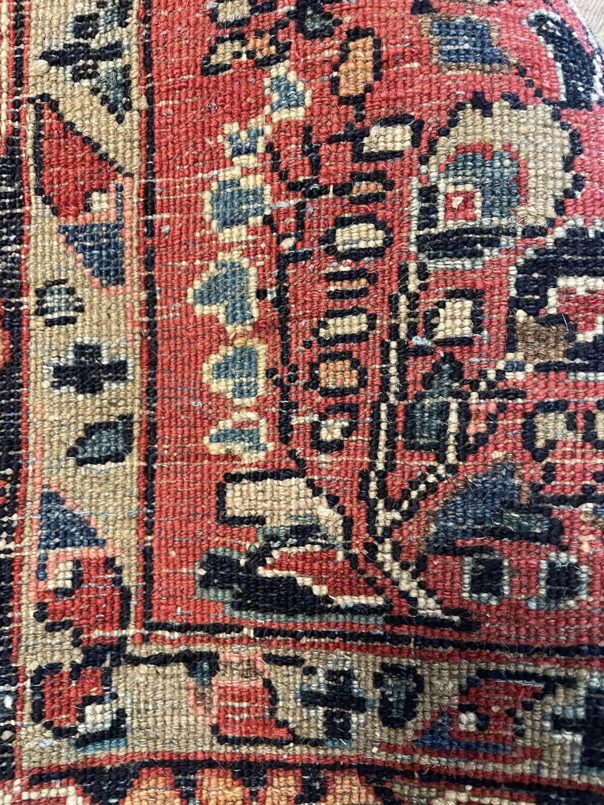 Handmade Oriental Rug with Vibrant Red Central Field
