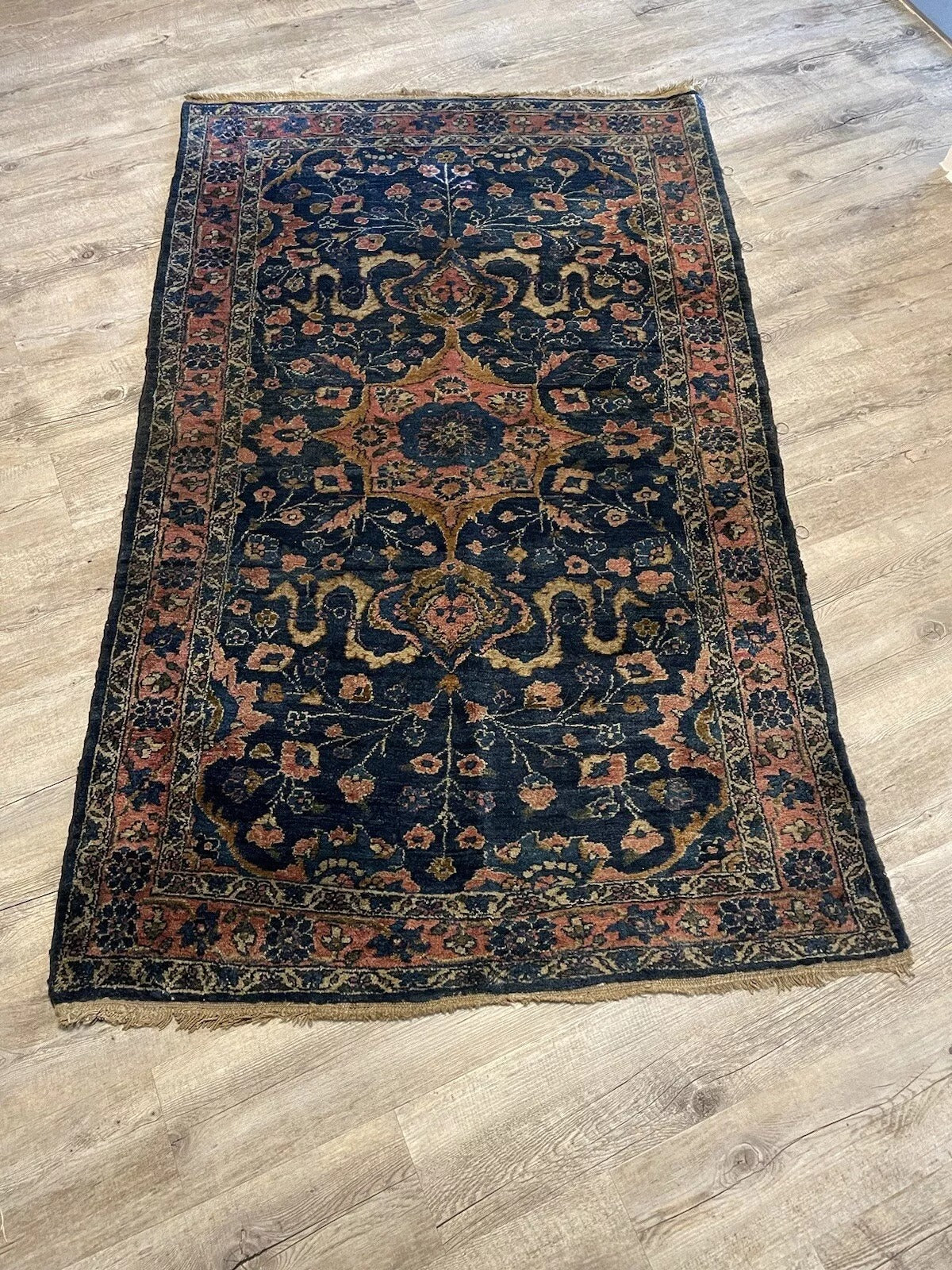 Persian Wool Rug with Elegant Floral Motifs and Rich Colors
