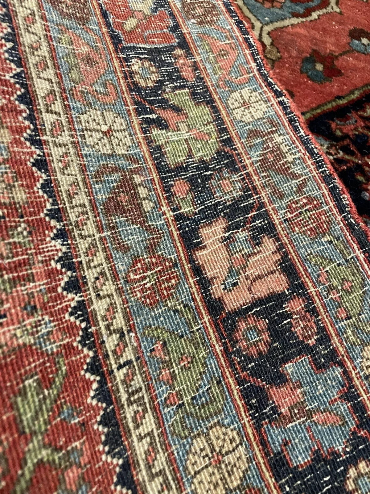 Vintage Bidjar rug with intricate floral and geometric patterns
