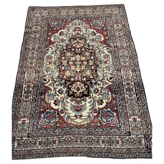 Handmade antique Kerman Lavar wool rug from the 1880s, 4.9' x 7'
