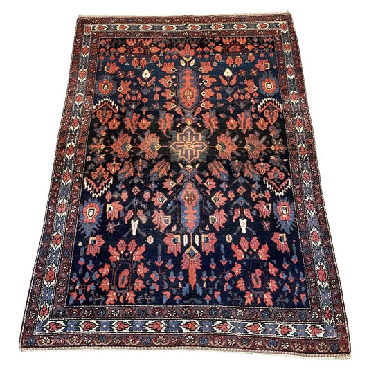 Handmade antique Bakhtiari wool rug from the 1920s, 4.4' x 6.4'
