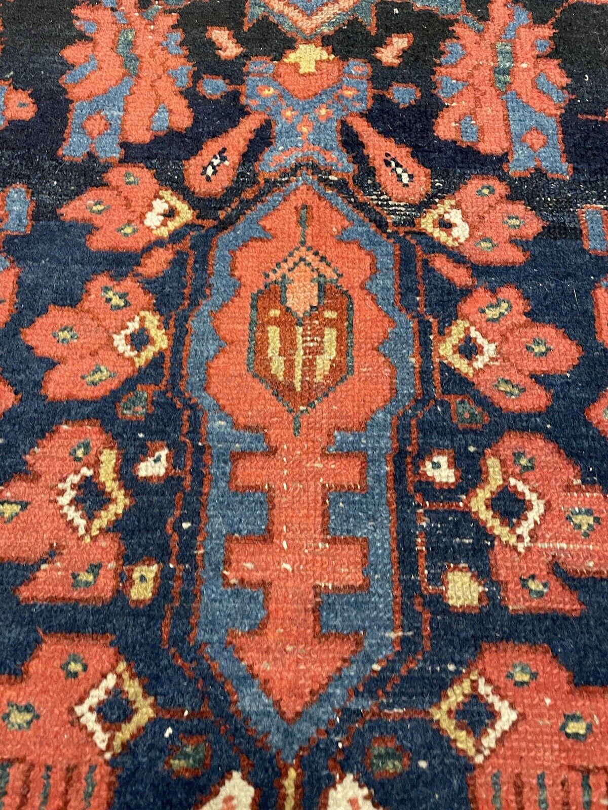 Aged wool Bakhtiari rug with bold geometric borders
