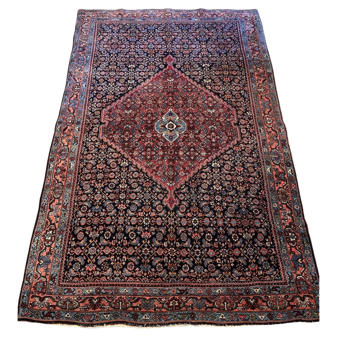 Handmade antique Bidjar wool rug from the 1920s, 4.6' x 7.3'
