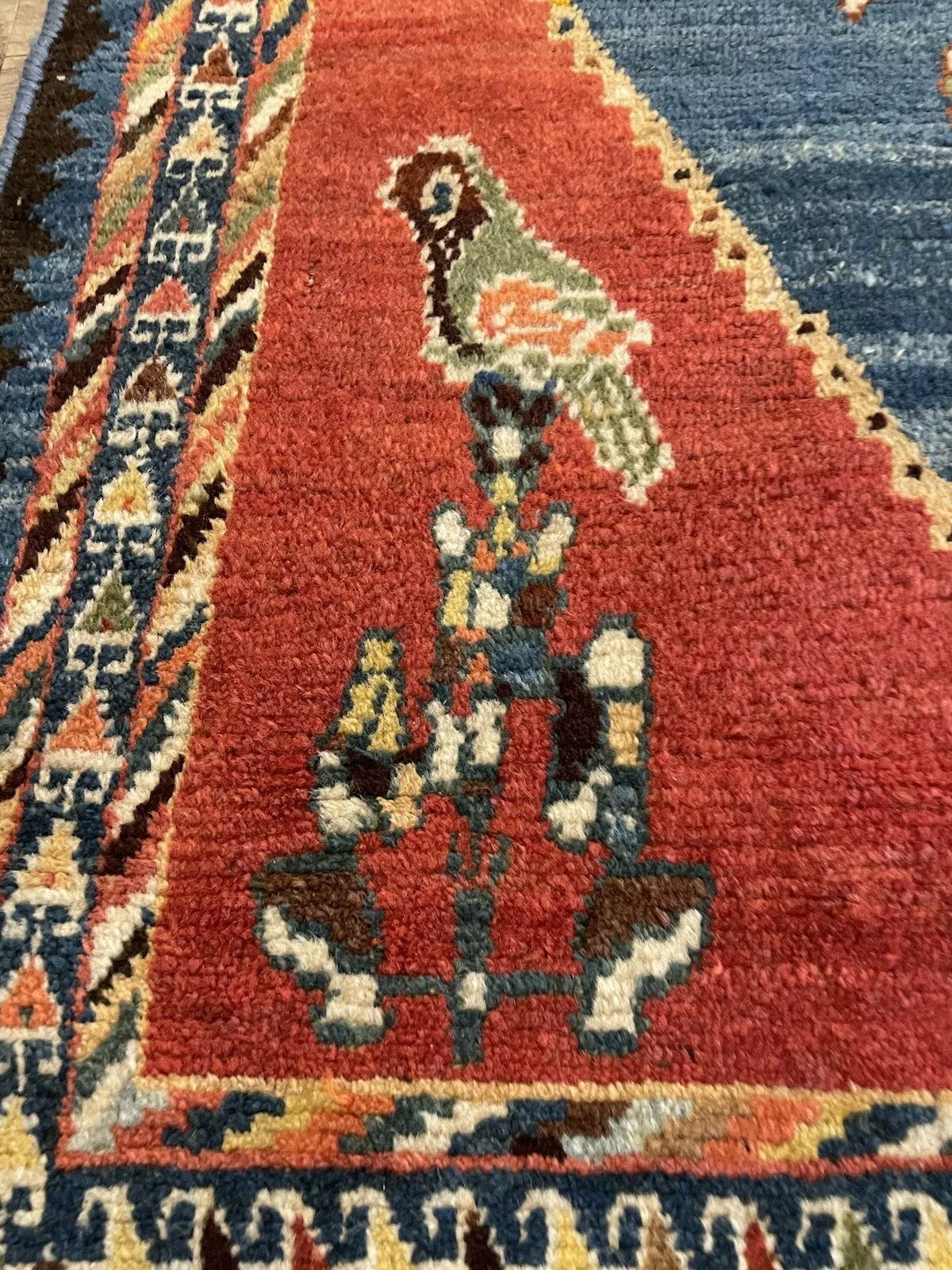 Classic geometric and floral details on a well-preserved Gabbeh rug
