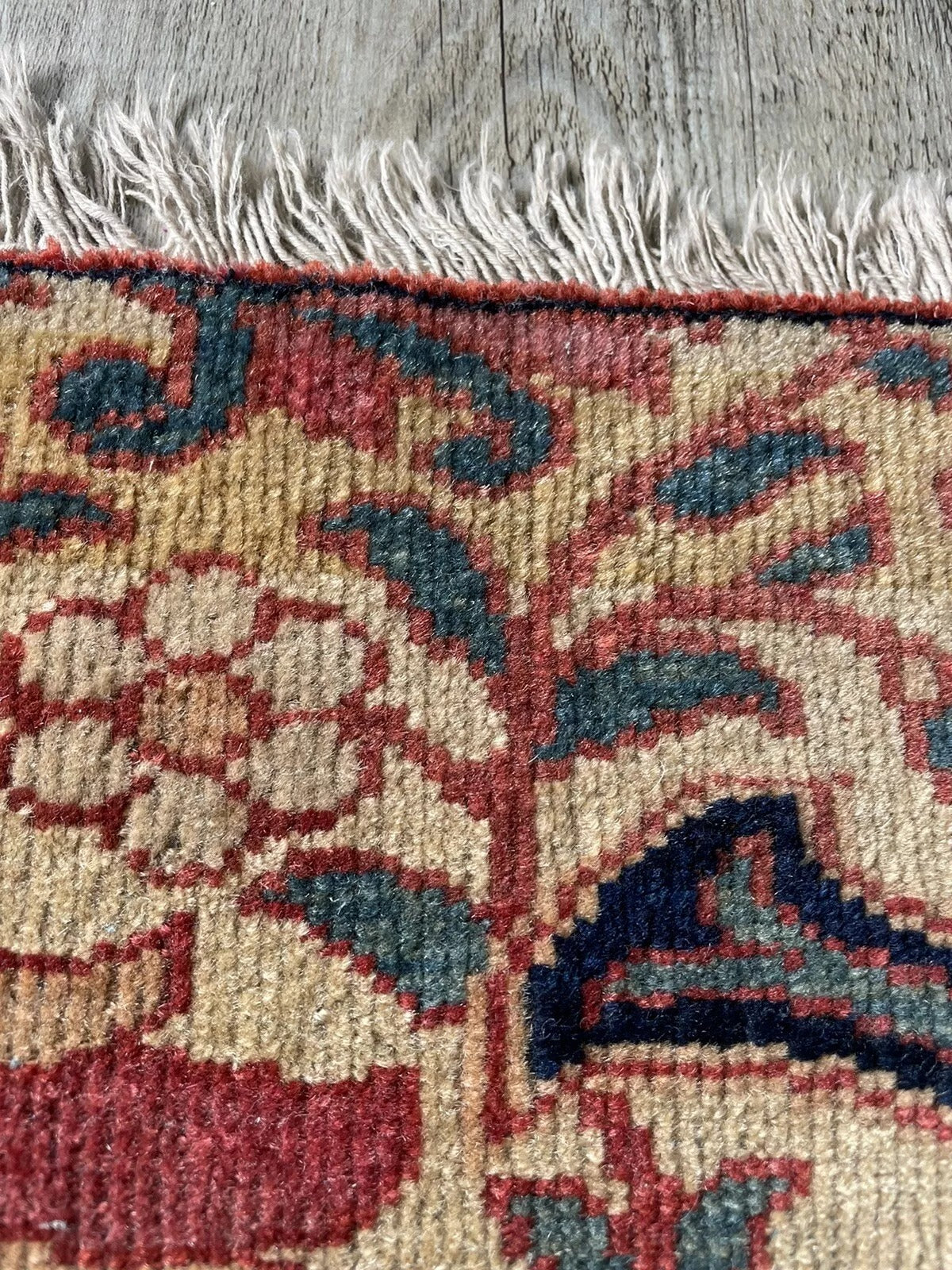 Richly colored vintage wool rug with refined detailing
