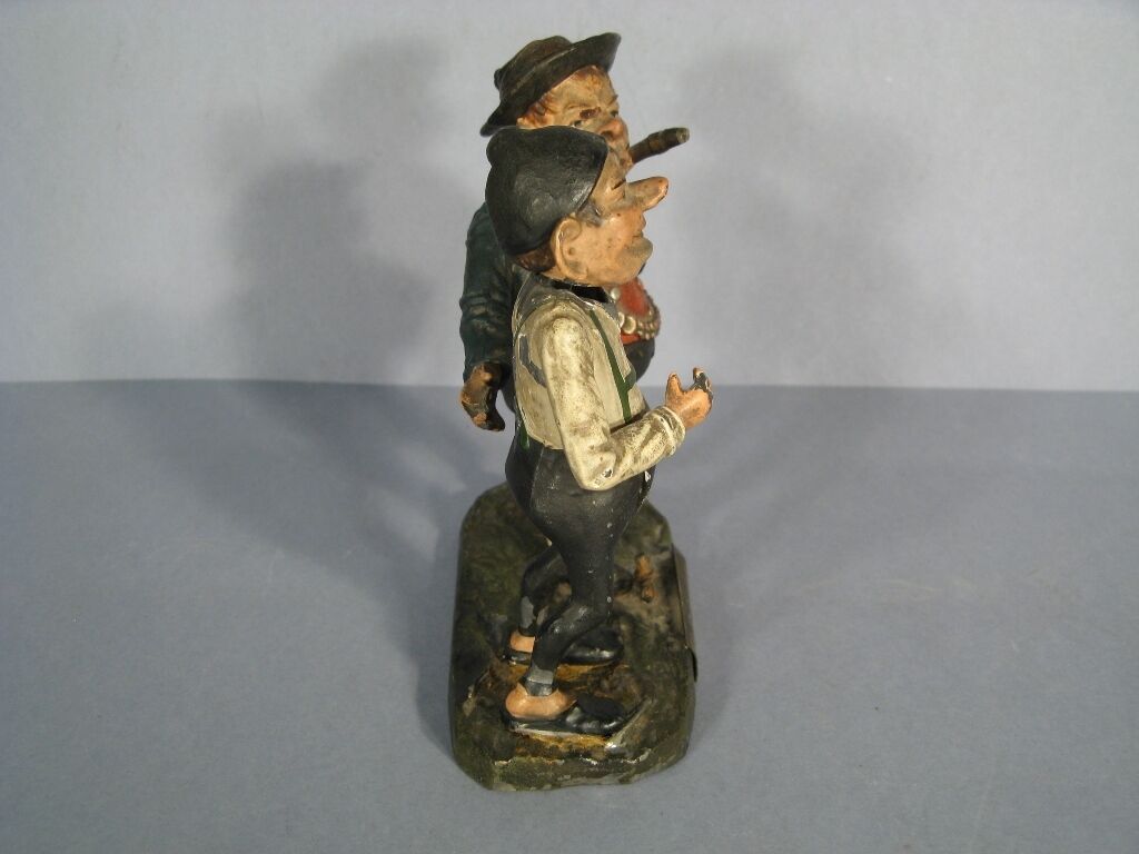 Vintage animated figurine depicting distrust in caricature style.
