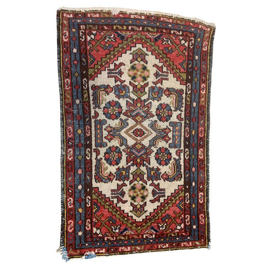 Handmade antique Persian Hamadan rug from the 1920s.
