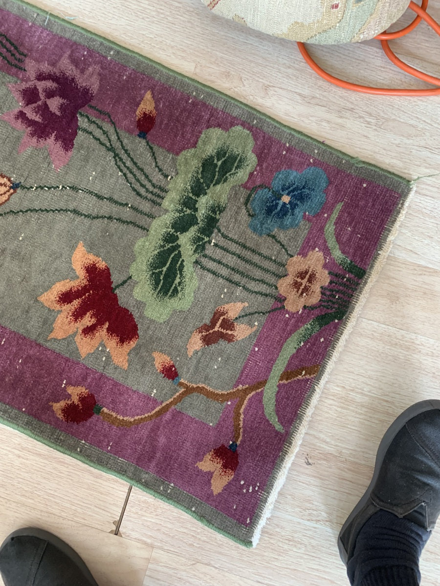 Top-down shot of the entire Chinese Art Deco rug, showing proportions.
