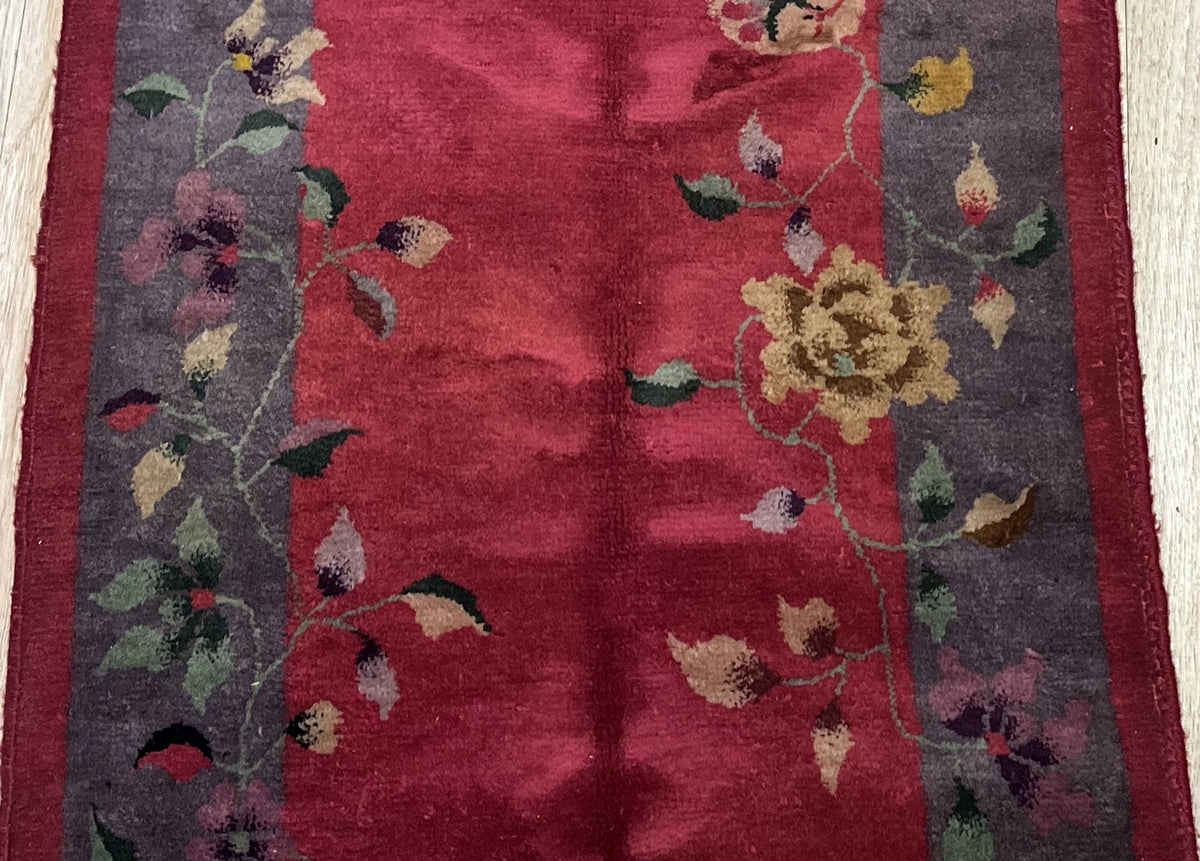 Soft, plush wool texture of the 1920s handmade Chinese rug
