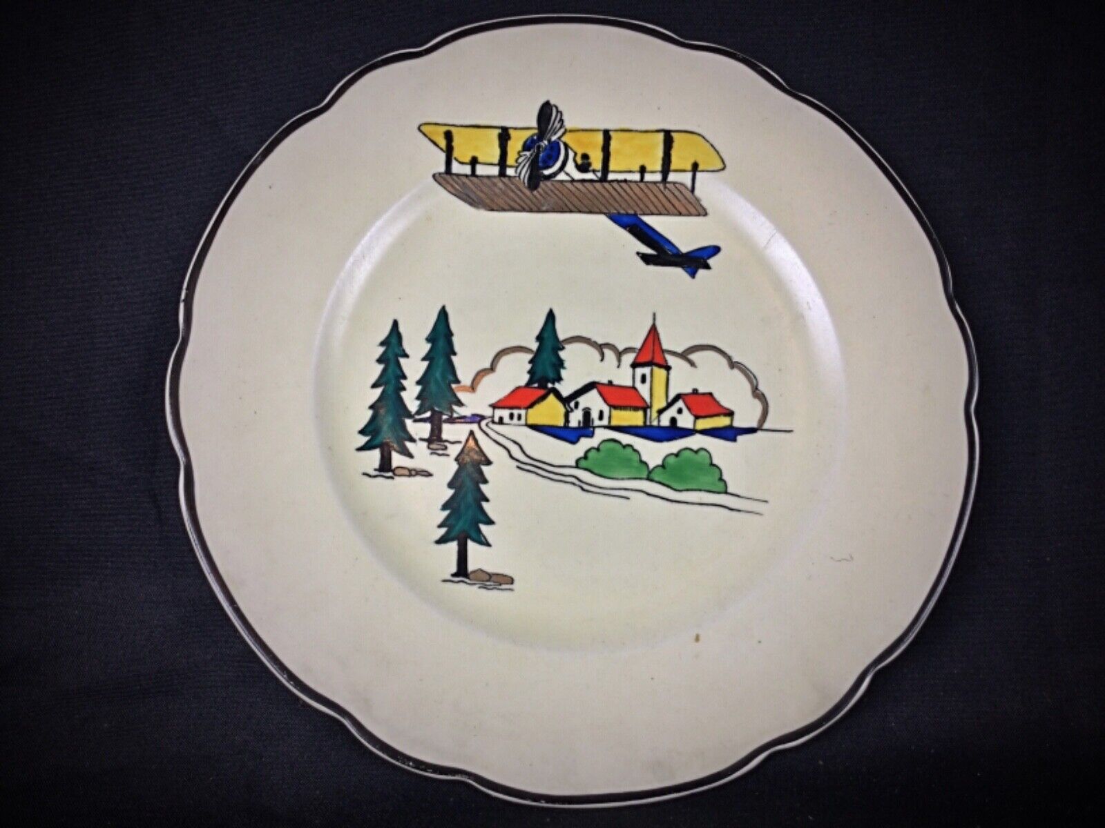 French porcelain plate with a delicate hand-painted rural landscape
