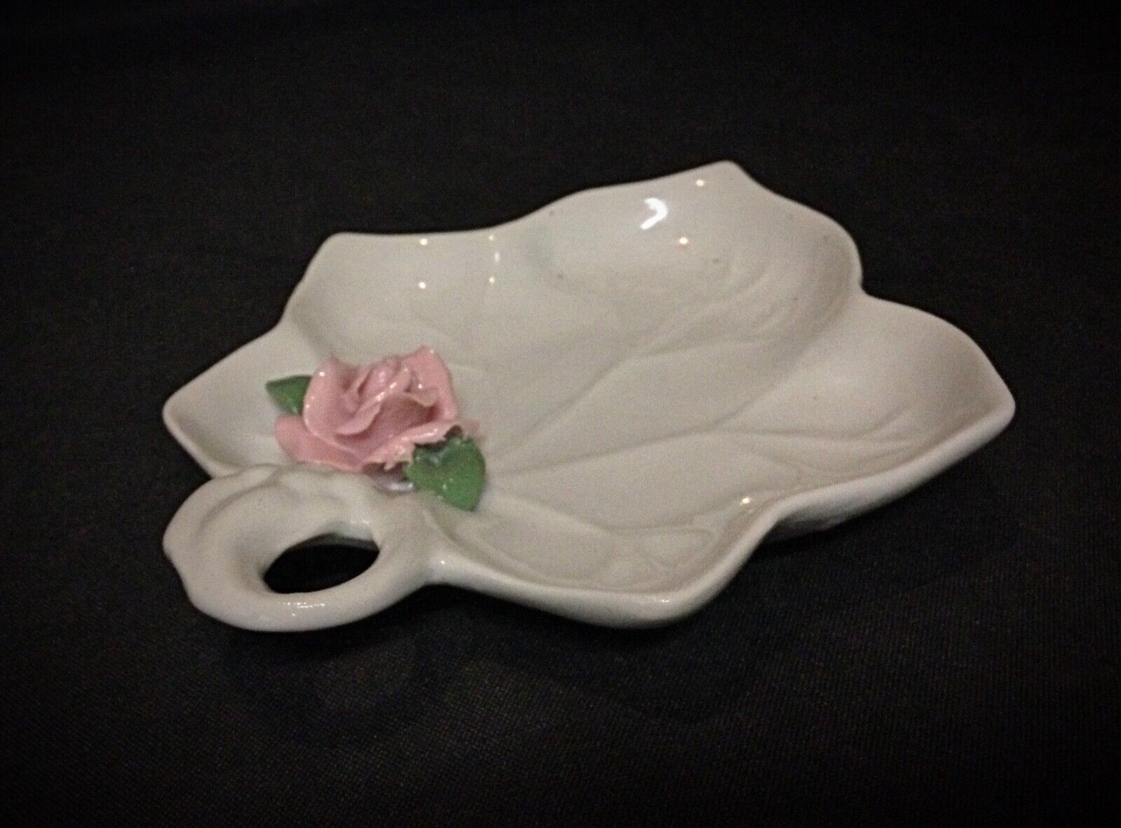 Ceramic rose design trinket dish, beautifully crafted for both practical use and display.
