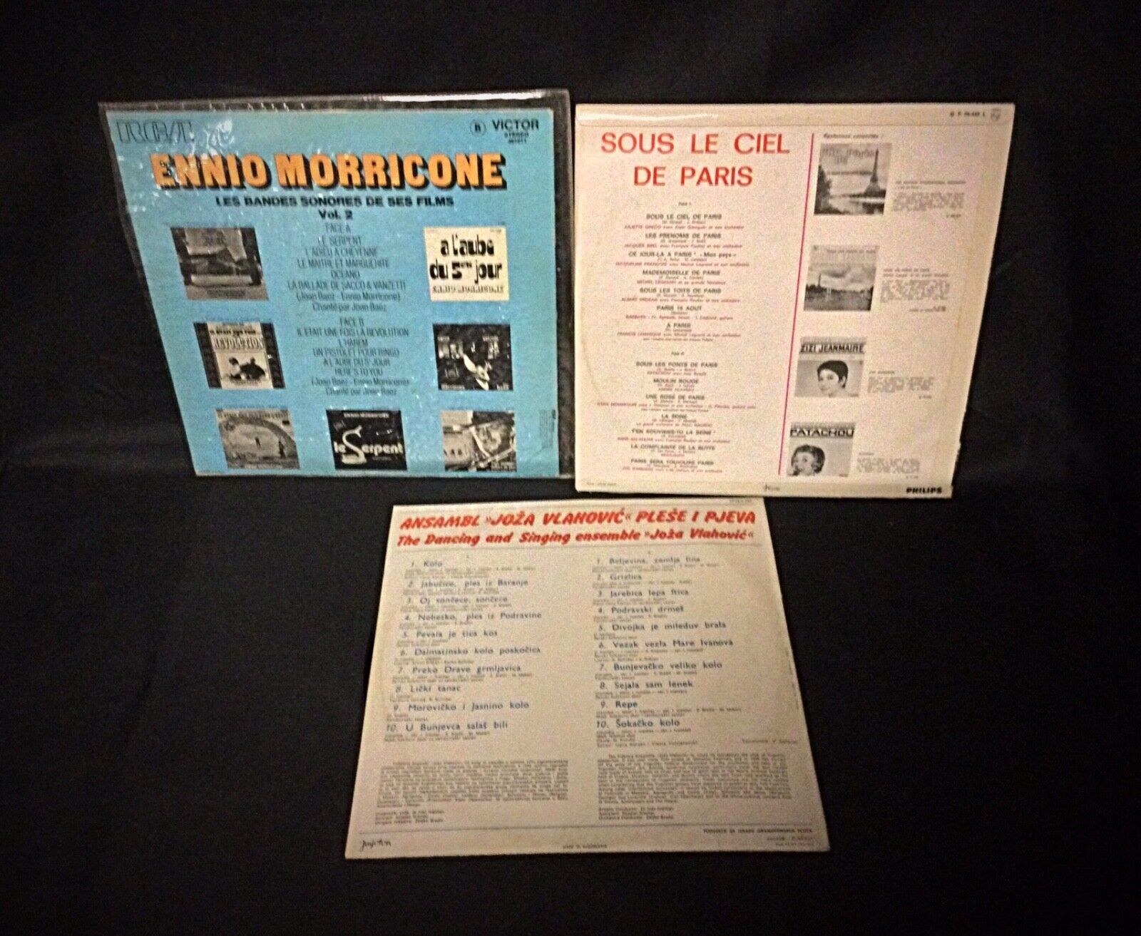 Back view of vinyl records showing condition and detailed album covers.