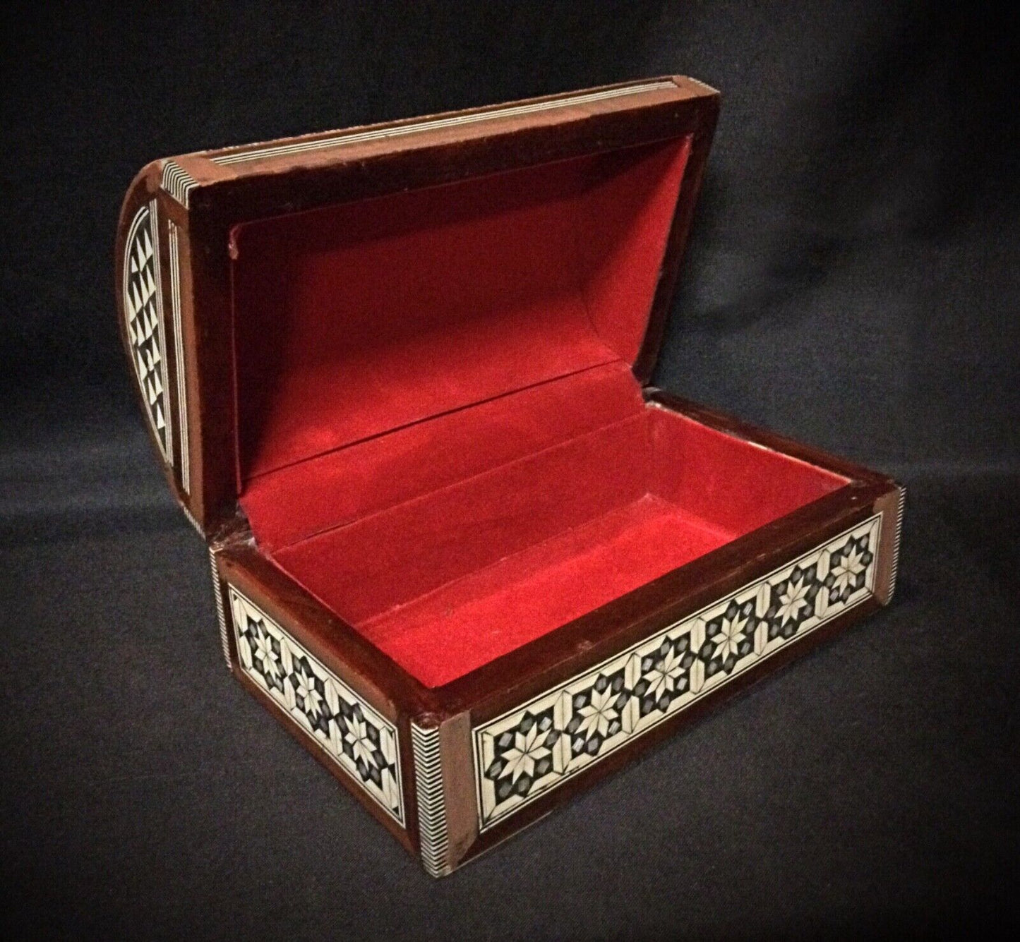 Close-up of mother-of-pearl inlay on the antique Syrian jewelry box.
