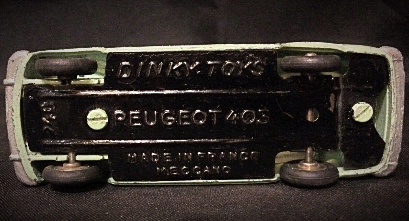 Underside of the model, showing the Dinky Toys branding and 'Made in France' marking.
