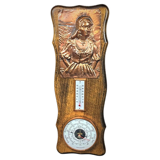 Vintage copper barometer and thermometer with bas-relief of a woman
