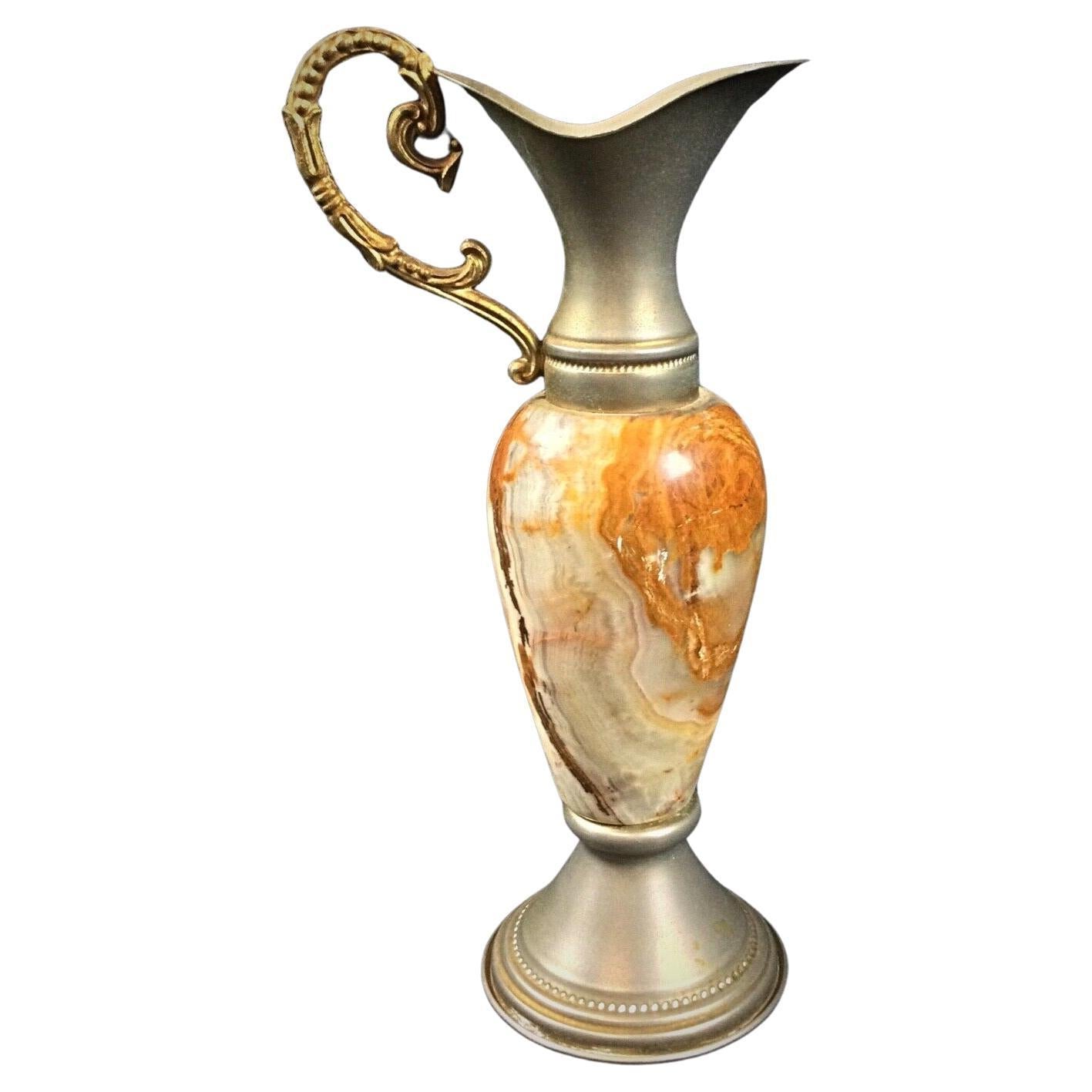 Small marbled onyx and pewter jug vase with elegant natural veining
