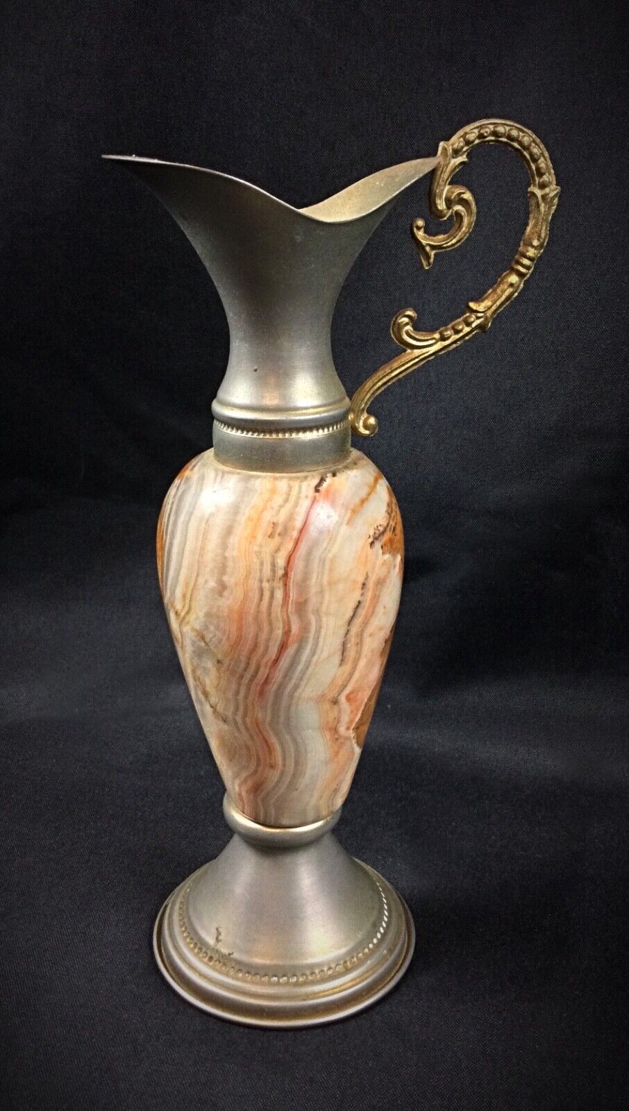 Multicolored onyx jug vase with classic design, perfect for home décor
