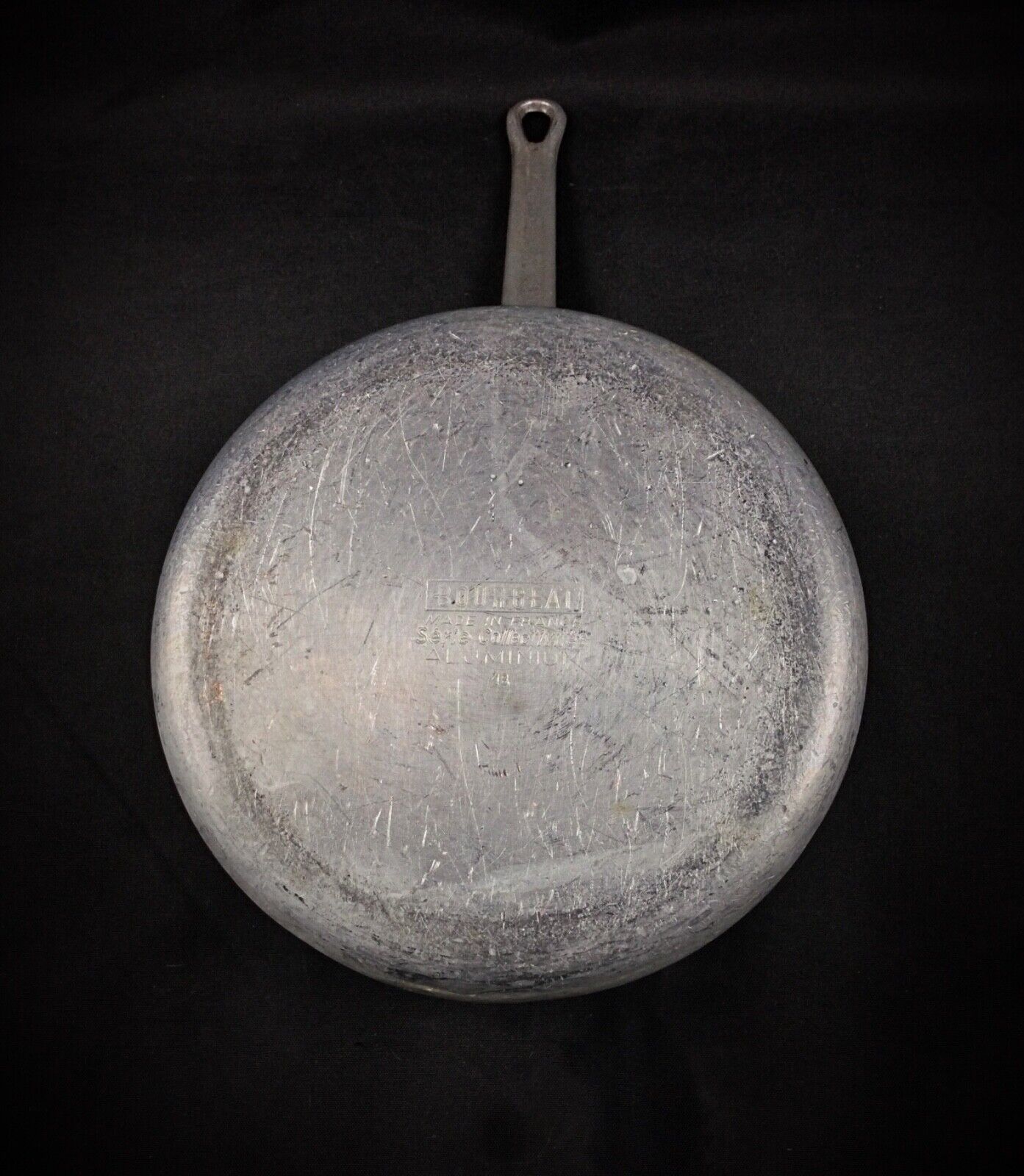 Interior of the saucepan with signs of vintage wear
