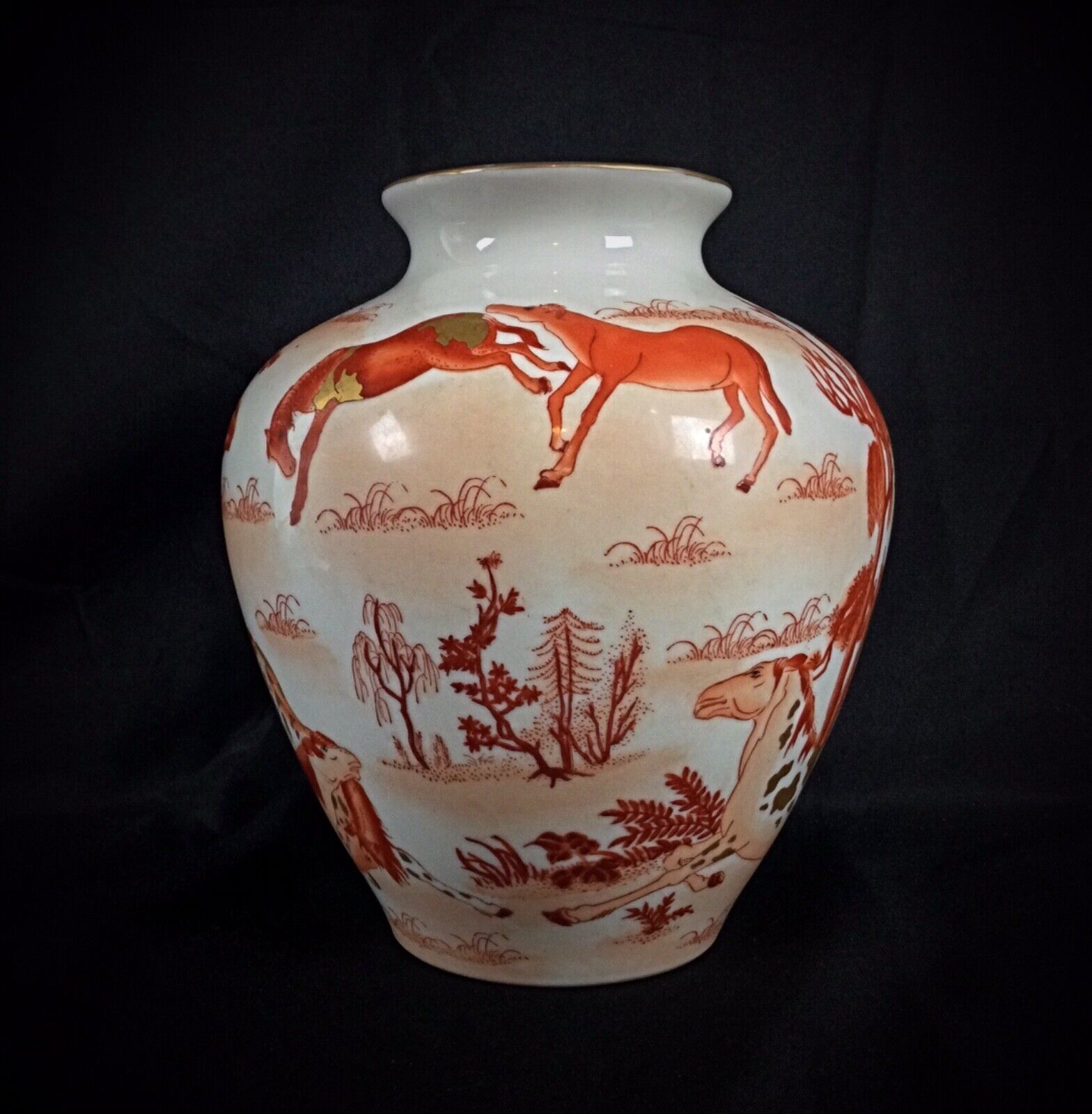 Chinese porcelain vase with delicate gilded accents
