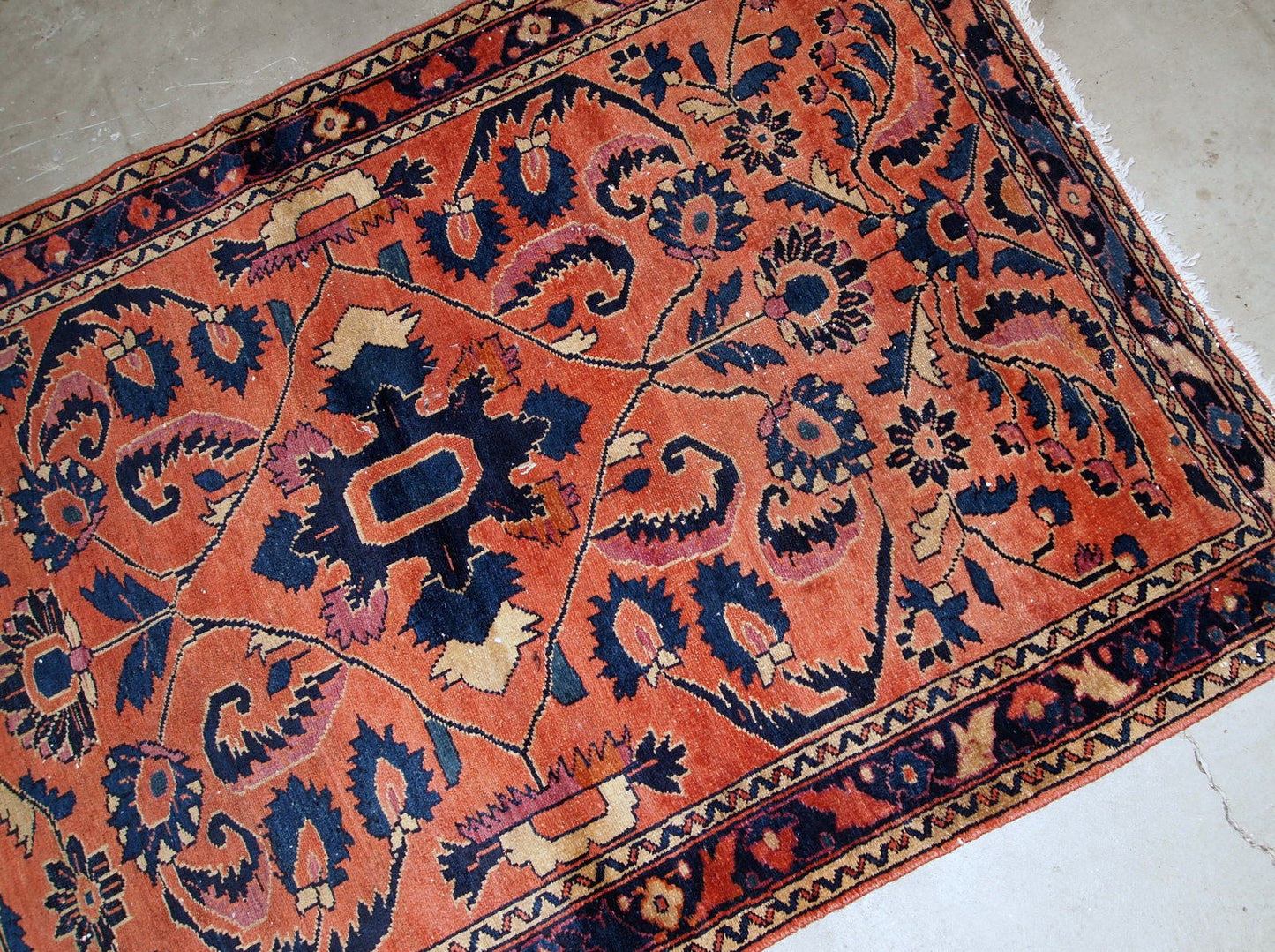 Handmade antique Persian Lilihan small rug in original good condition. The rug is from the beginning of 20th century made in wool on cotton.