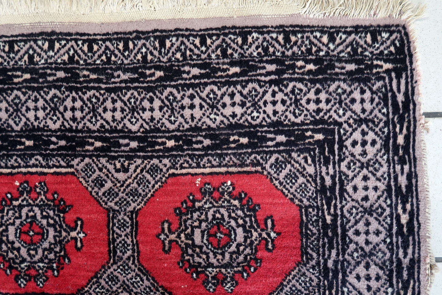 Handmade vintage Uzbek Bukhara rug 1970s