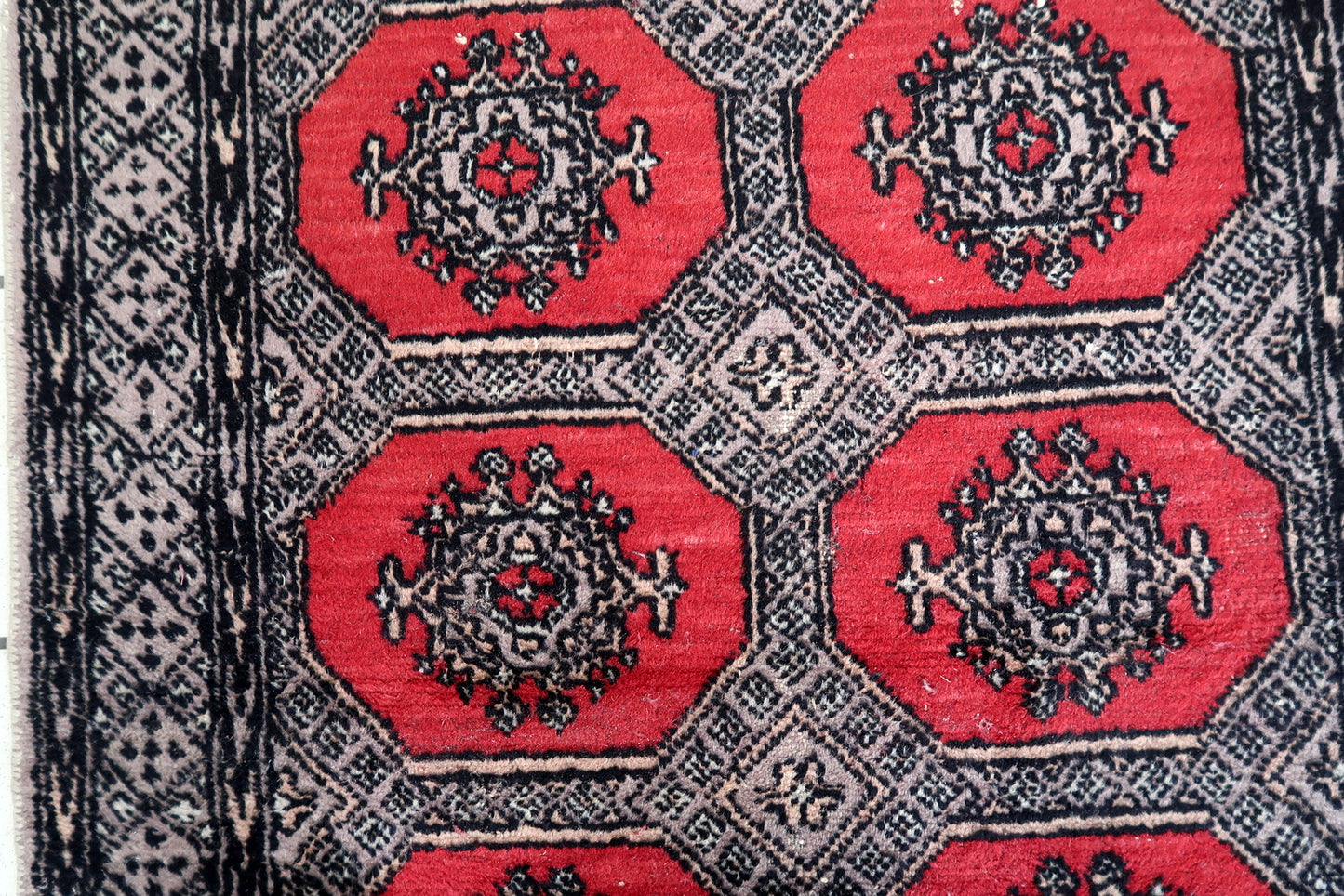 Handmade vintage Uzbek Bukhara rug 1970s