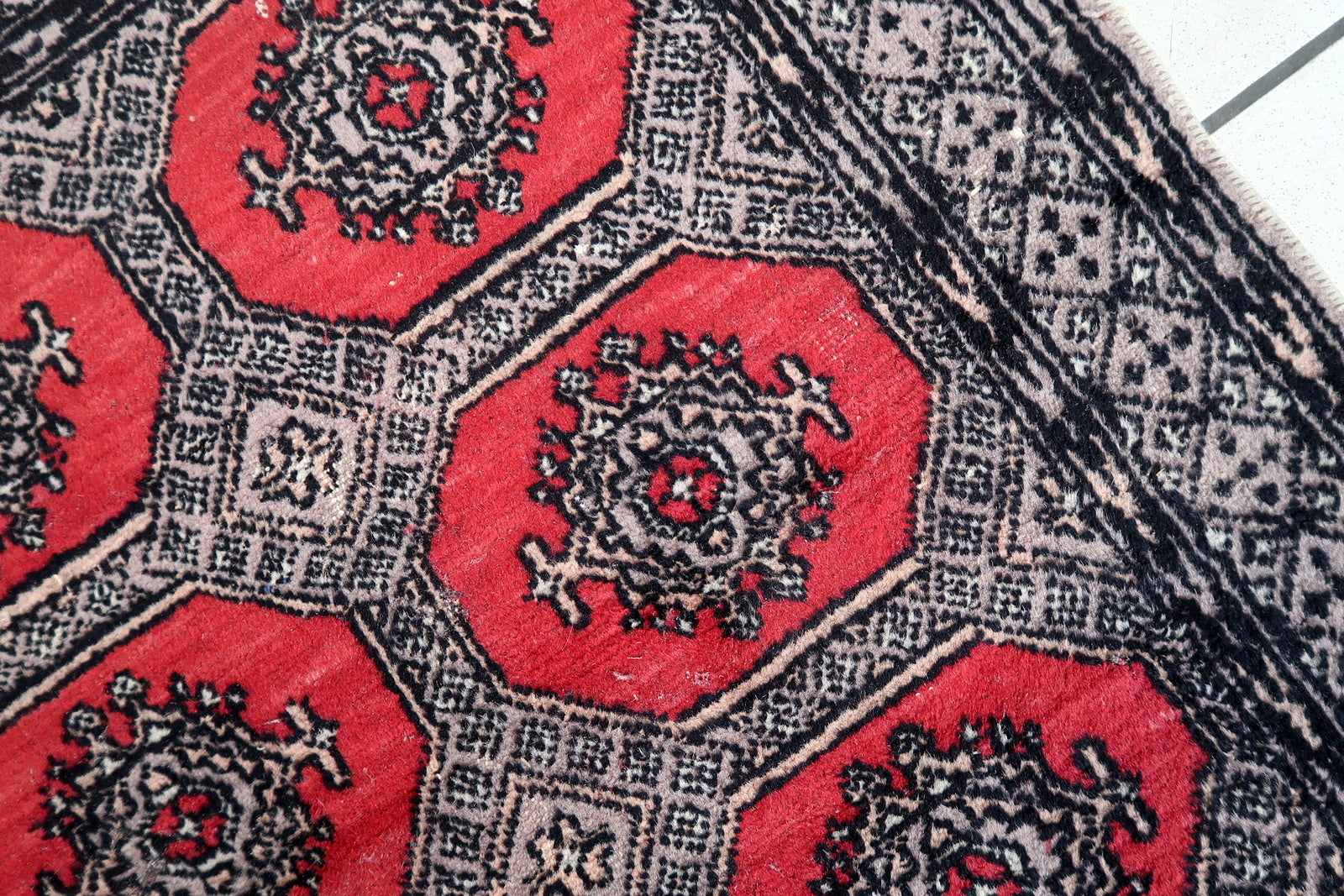 Handmade vintage Uzbek Bukhara rug 1970s