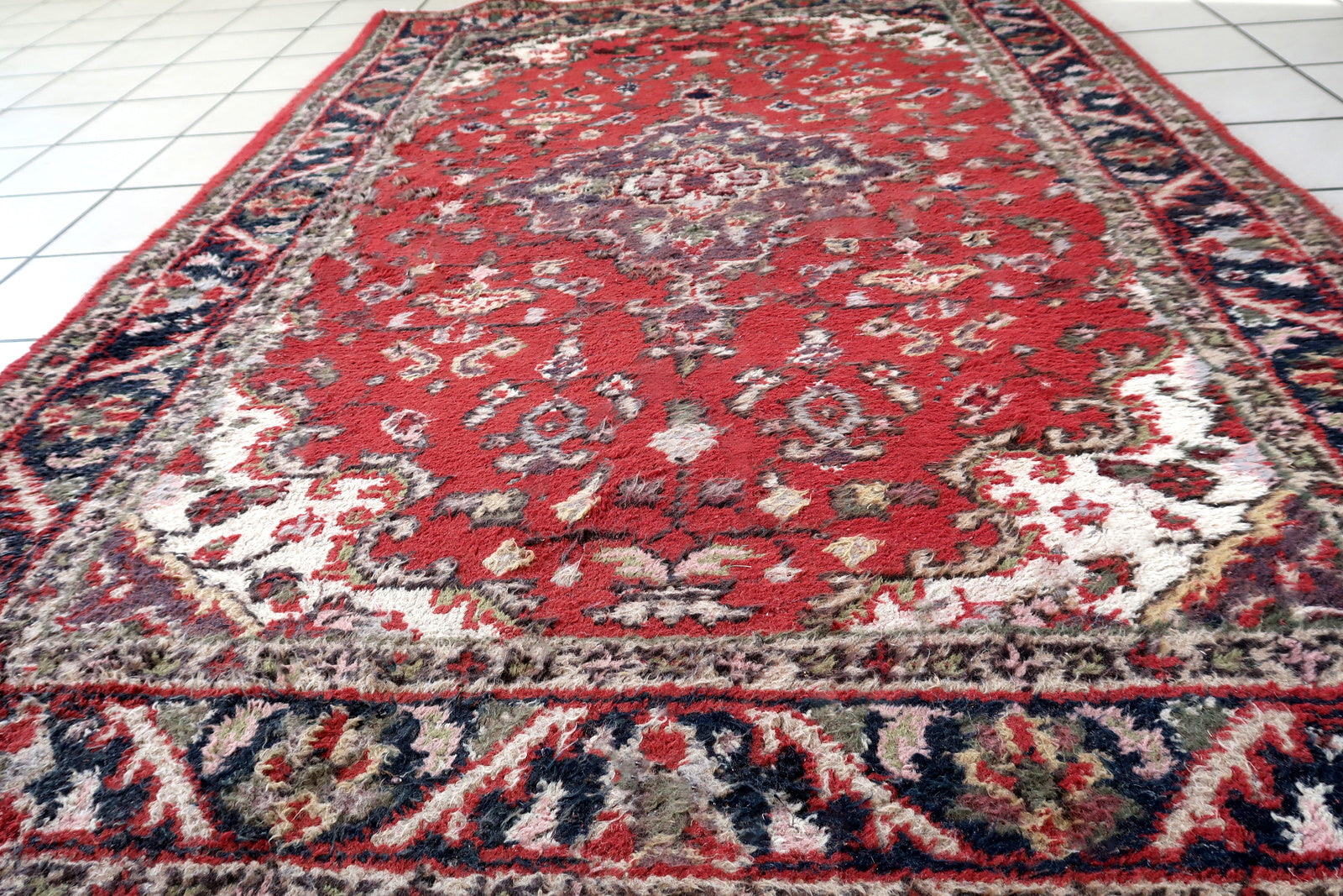 Handmade vintage Persian Hamadan rug in red and blue colors. The rug is from the end of 20th century in original good condition.