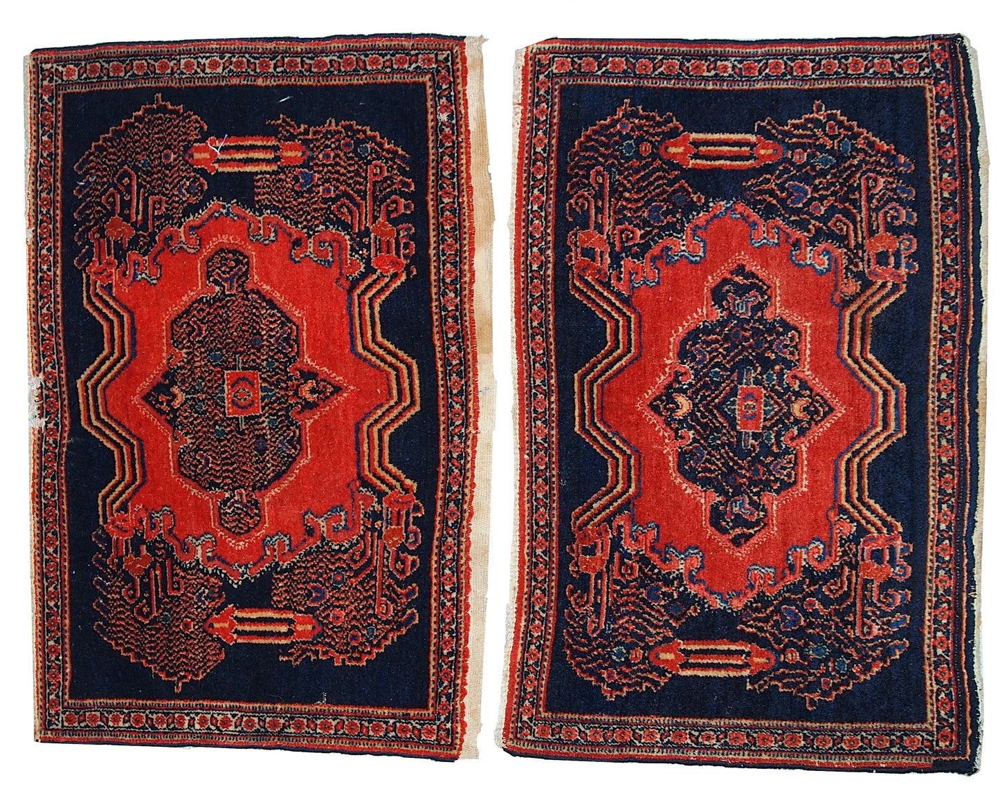 Handmade antique Persian pair of Senneh rugs, 1900s