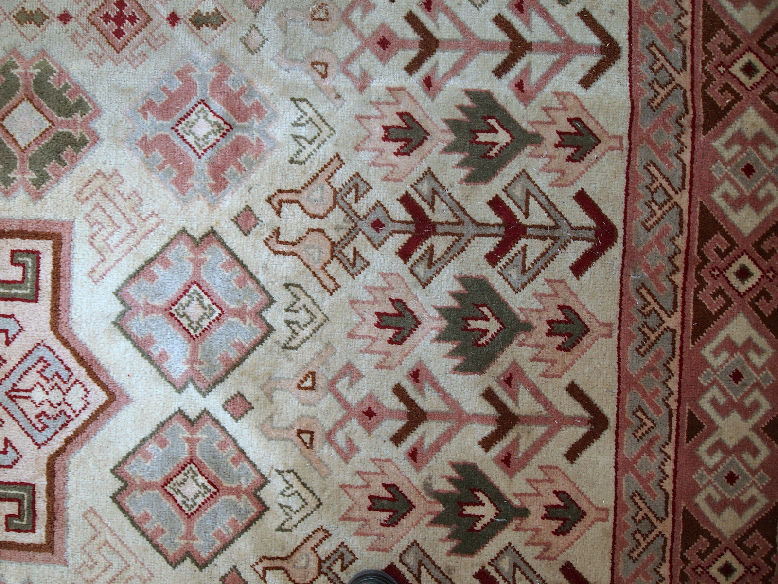 Handmade vintage Turkish Sivas rug in geometric design. The rug is in original condition, from the middle of 20th century. The rug has some age discolorations.