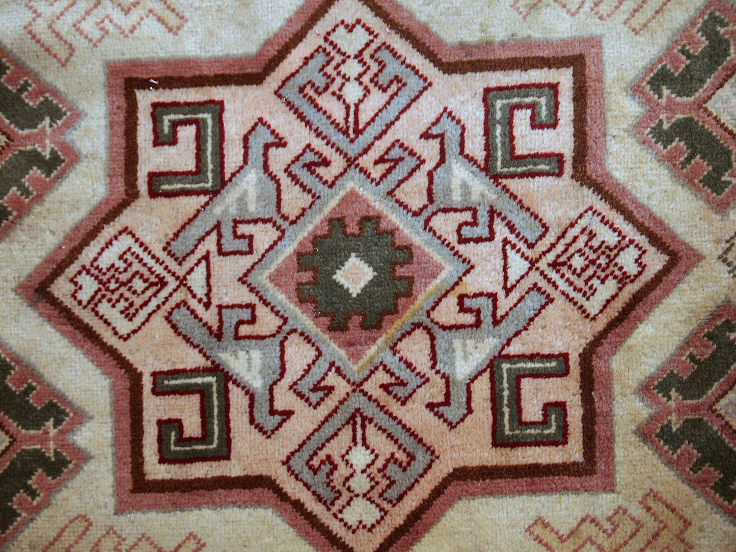 Handmade vintage Turkish Sivas rug in geometric design. The rug is in original condition, from the middle of 20th century. The rug has some age discolorations.