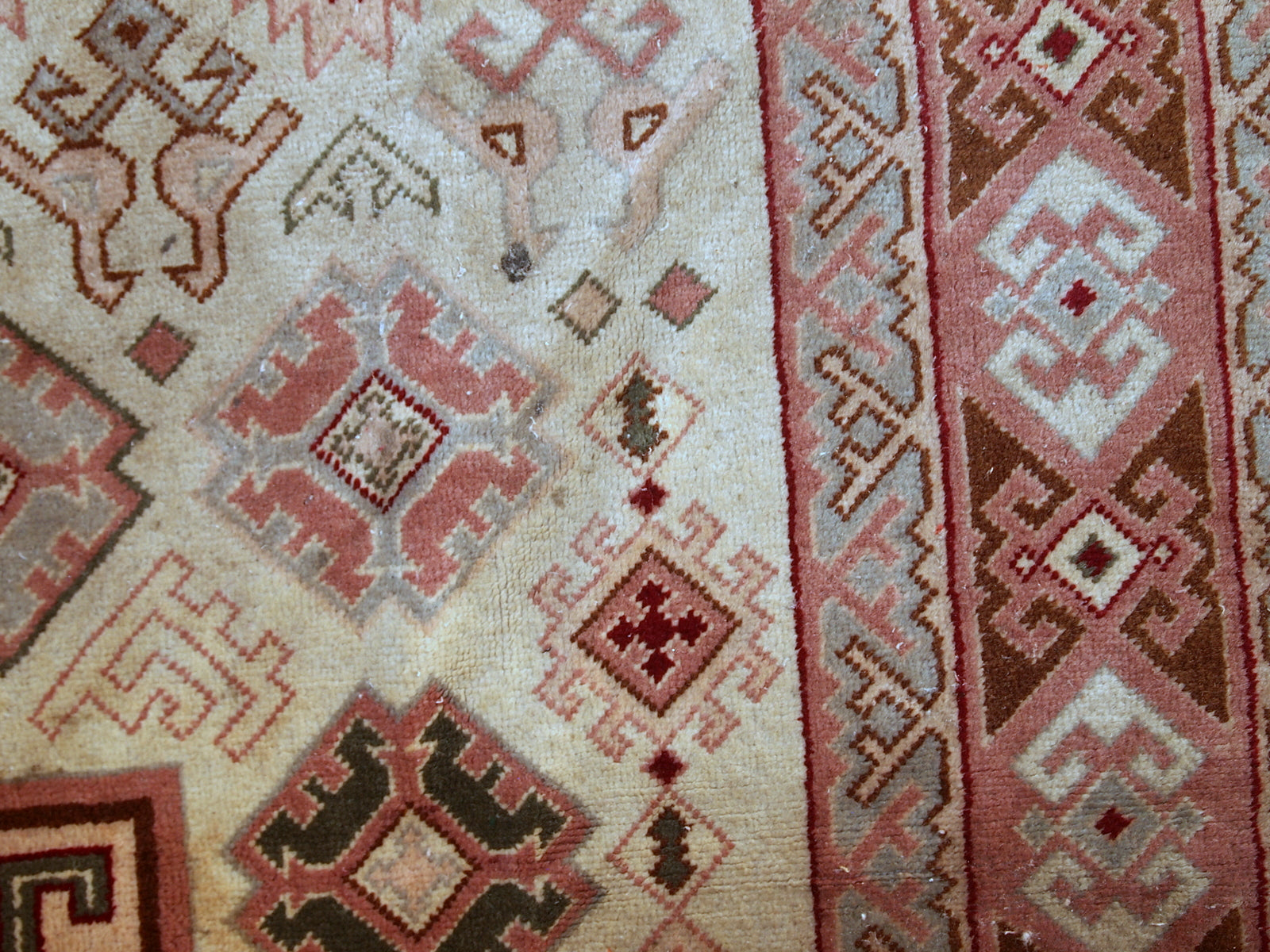 Handmade vintage Turkish Sivas rug in geometric design. The rug is in original condition, from the middle of 20th century. The rug has some age discolorations.