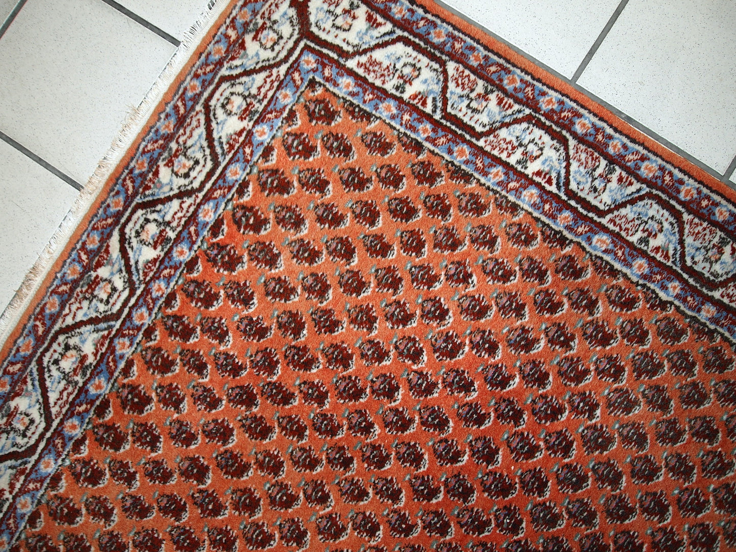 Handmade vintage Seraband rug from India, made in the end of 20th century. The rug is in original good condition. It has been made in traditional all-over design.