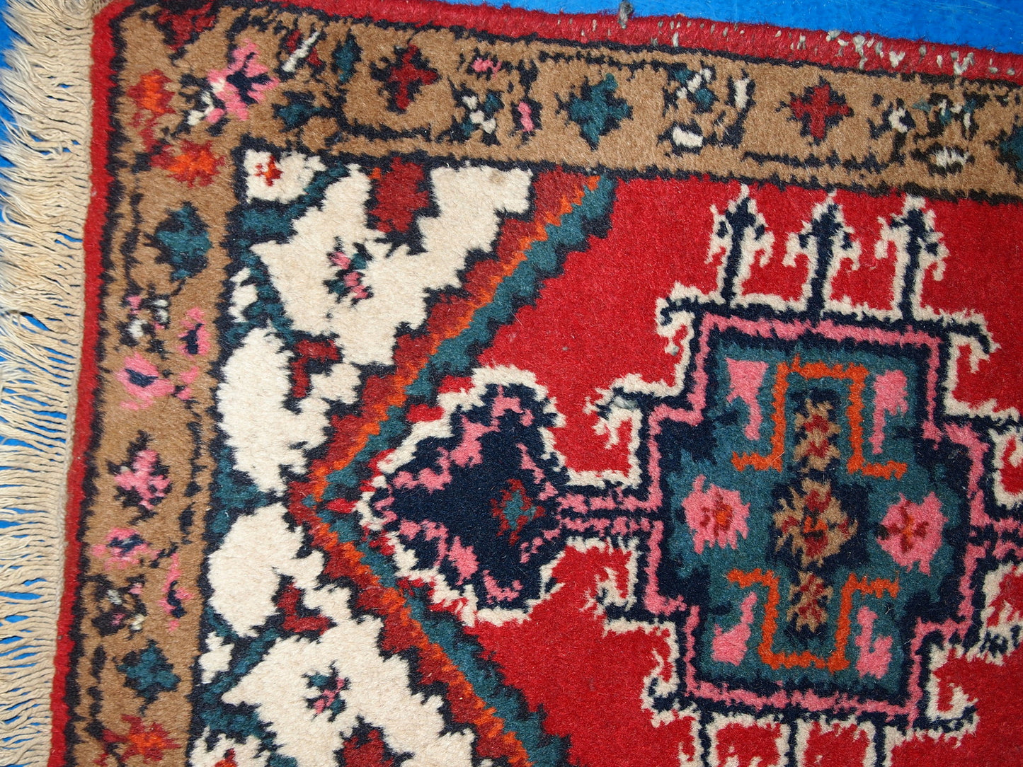 Vintage handmade Middle Eastern mat in original good condition. The rug is from the end of 20th century.