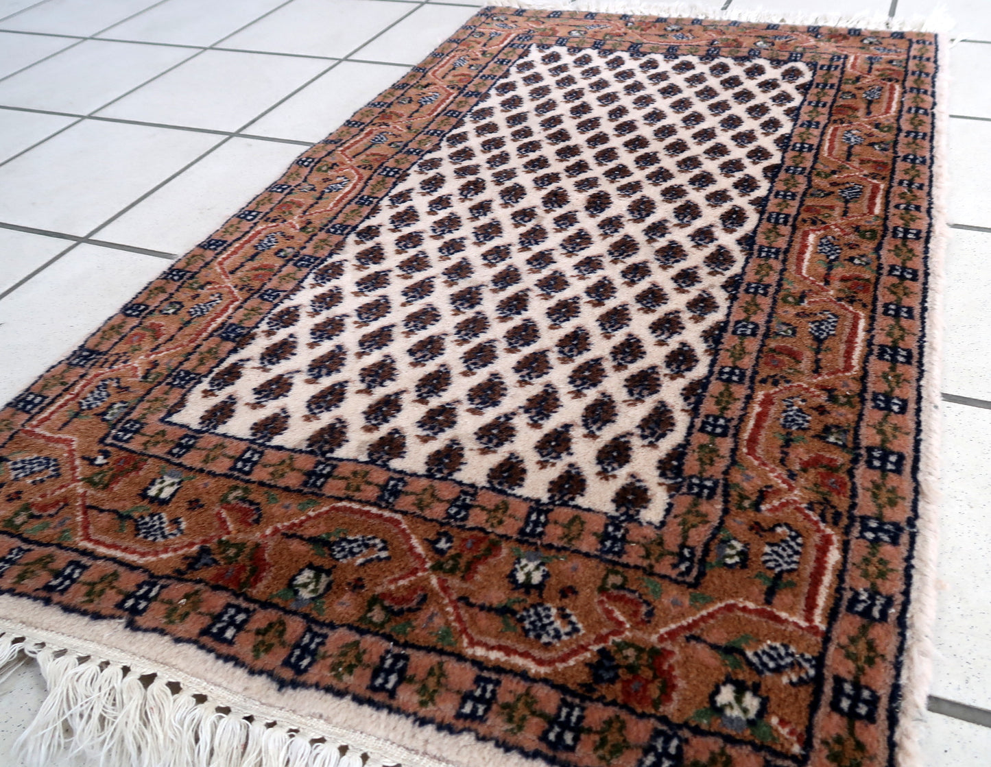 Handmade vintage Indian Seraband rug in original good condition. The rug has been made in traditional pattern, it is from circa1970s. 