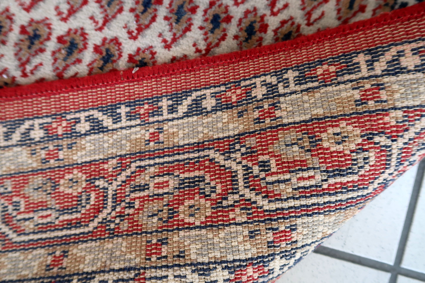 Vintage Italian rug with Seraband design made by Roma Super company. The rug is from the end of 20th century, it is in original good condition. This rug is machine made
