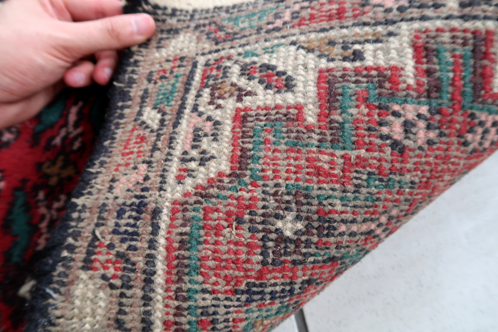 Handmade vintage Middle Eastern rug in traditional medallion design. The rug has been made in wool in the end of 20th century. It is in original good condition.