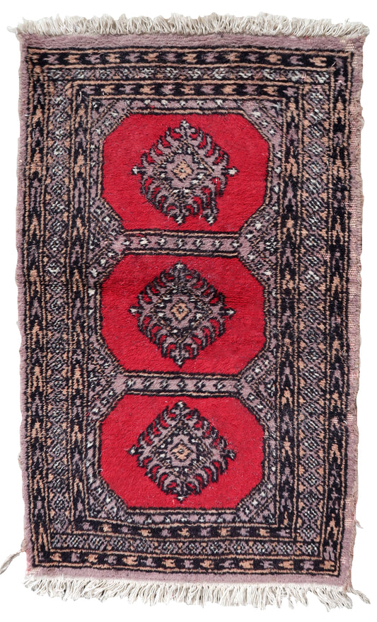 Handmade vintage Uzbek Bukhara rug 1970s