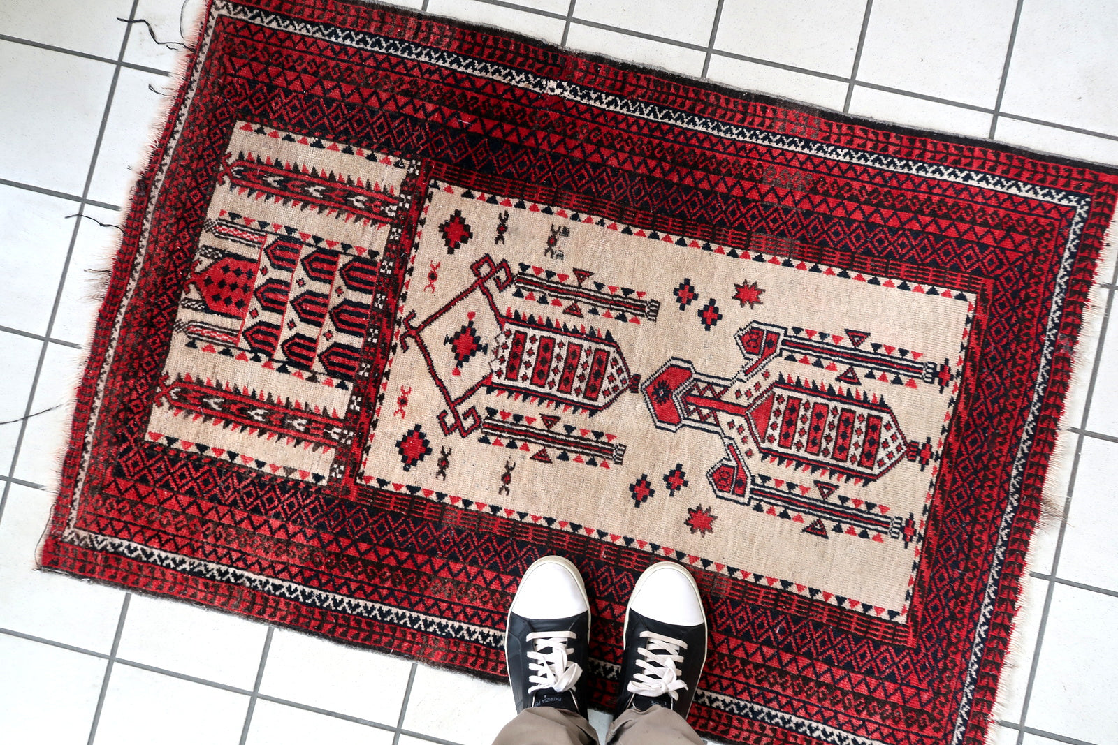 Handmade antique Afghan rug from Baluchi region. This prayer rug made in the beginning of 20th century, it is in original condition, has some low pile. 