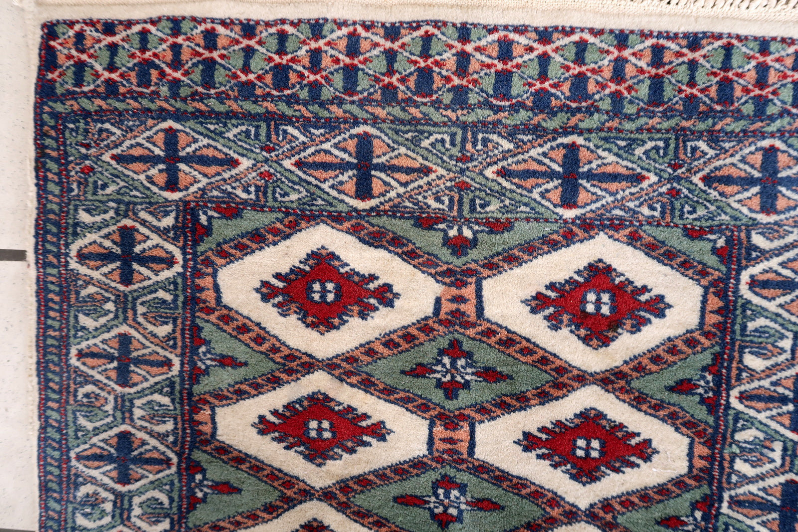 Handmade vintage Uzbek Bukhara rug 1970s