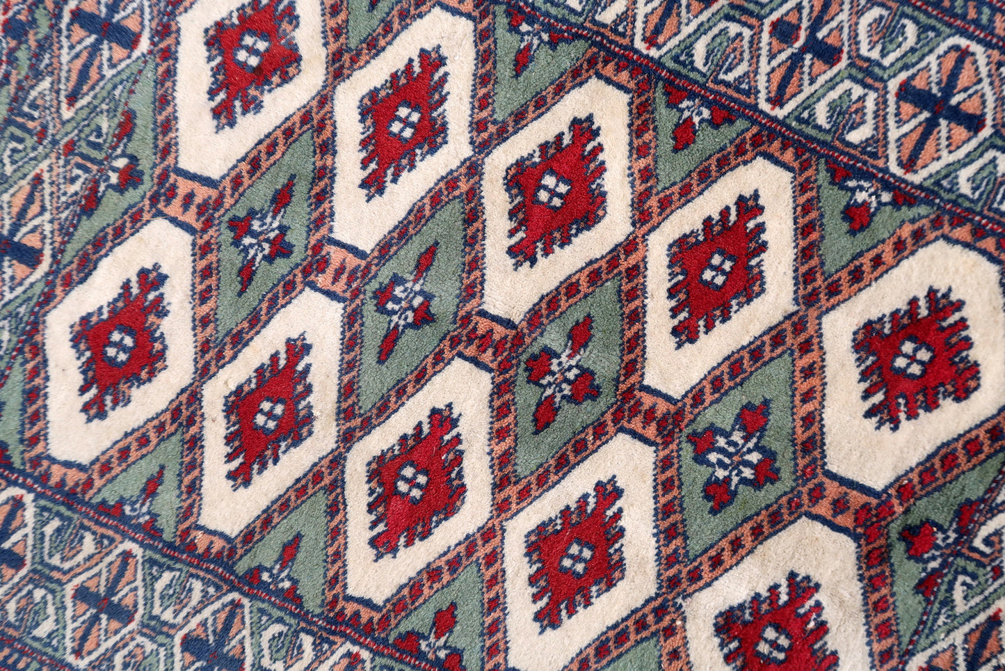 Handmade vintage Uzbek Bukhara rug 1970s