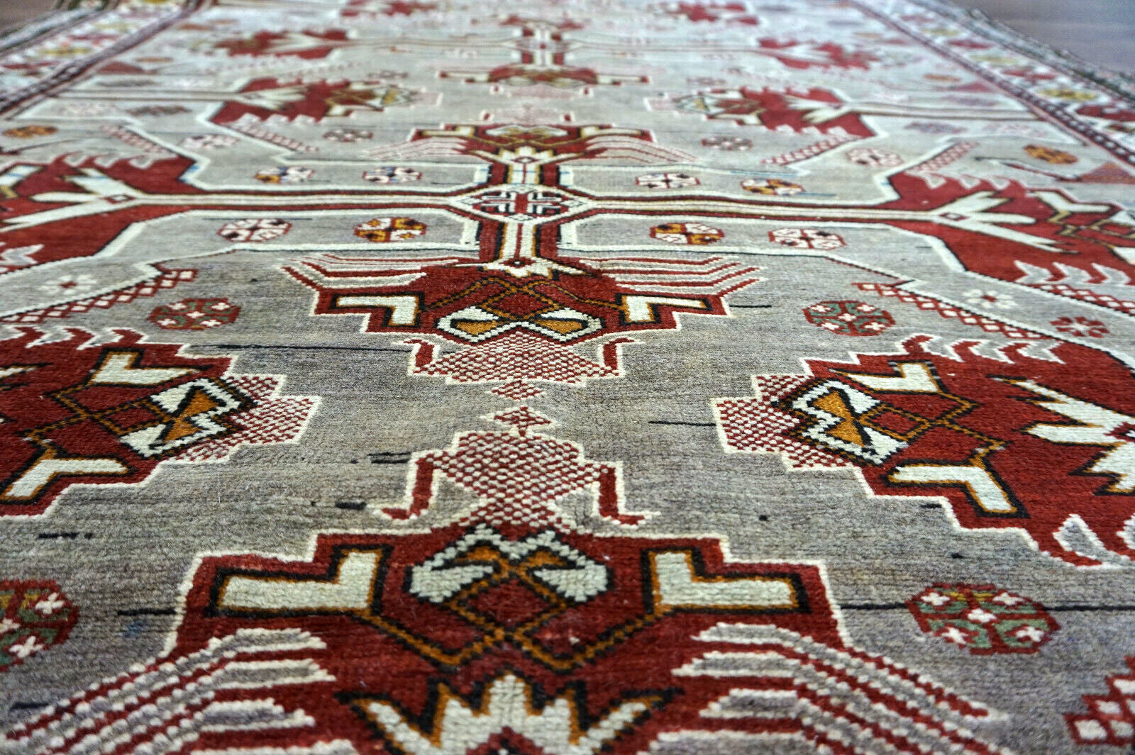 Handmade vintage Caucasian Shirvan rug in unusual cross design. The rug is from the middle of 20th century in original good condition.